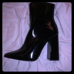 Black high heeled boots